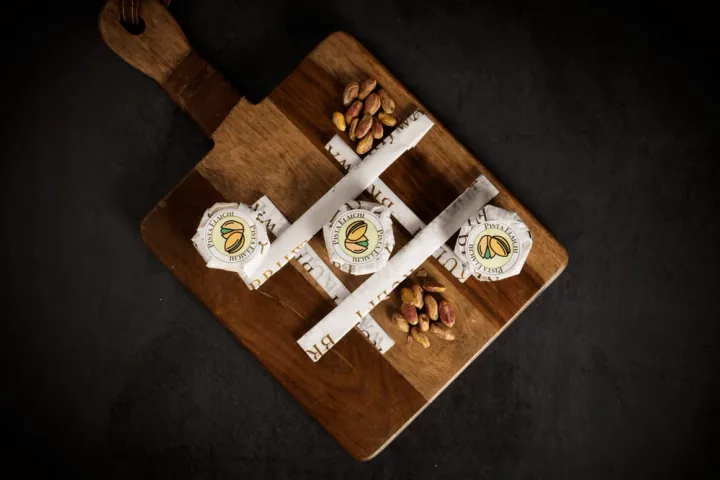 Pista bite kulfi board presentation